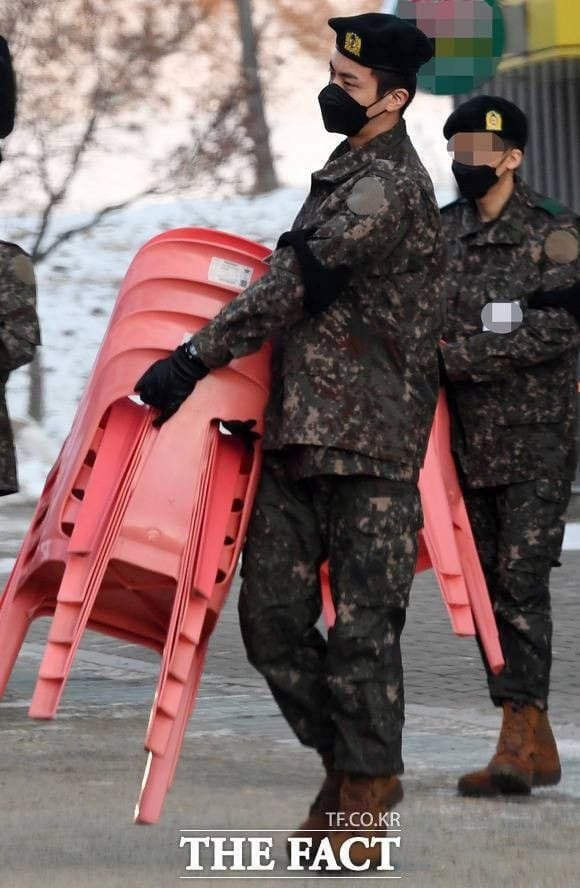 Jin serving in the military.