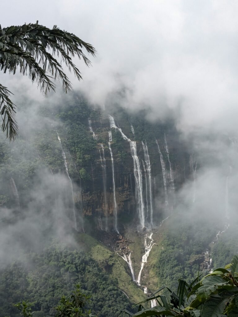 Cherrapunji waterfalls covered in clouds